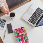 The Rise of Side Hustles: How Gen Z Is Redefining Work top view laptop coffee table 1